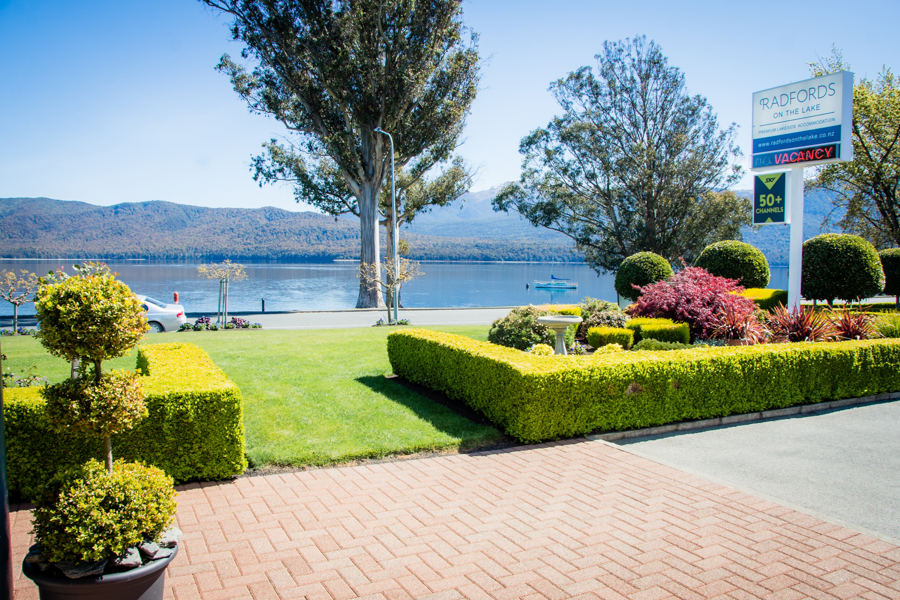 A garden view next to Lake Te Anau